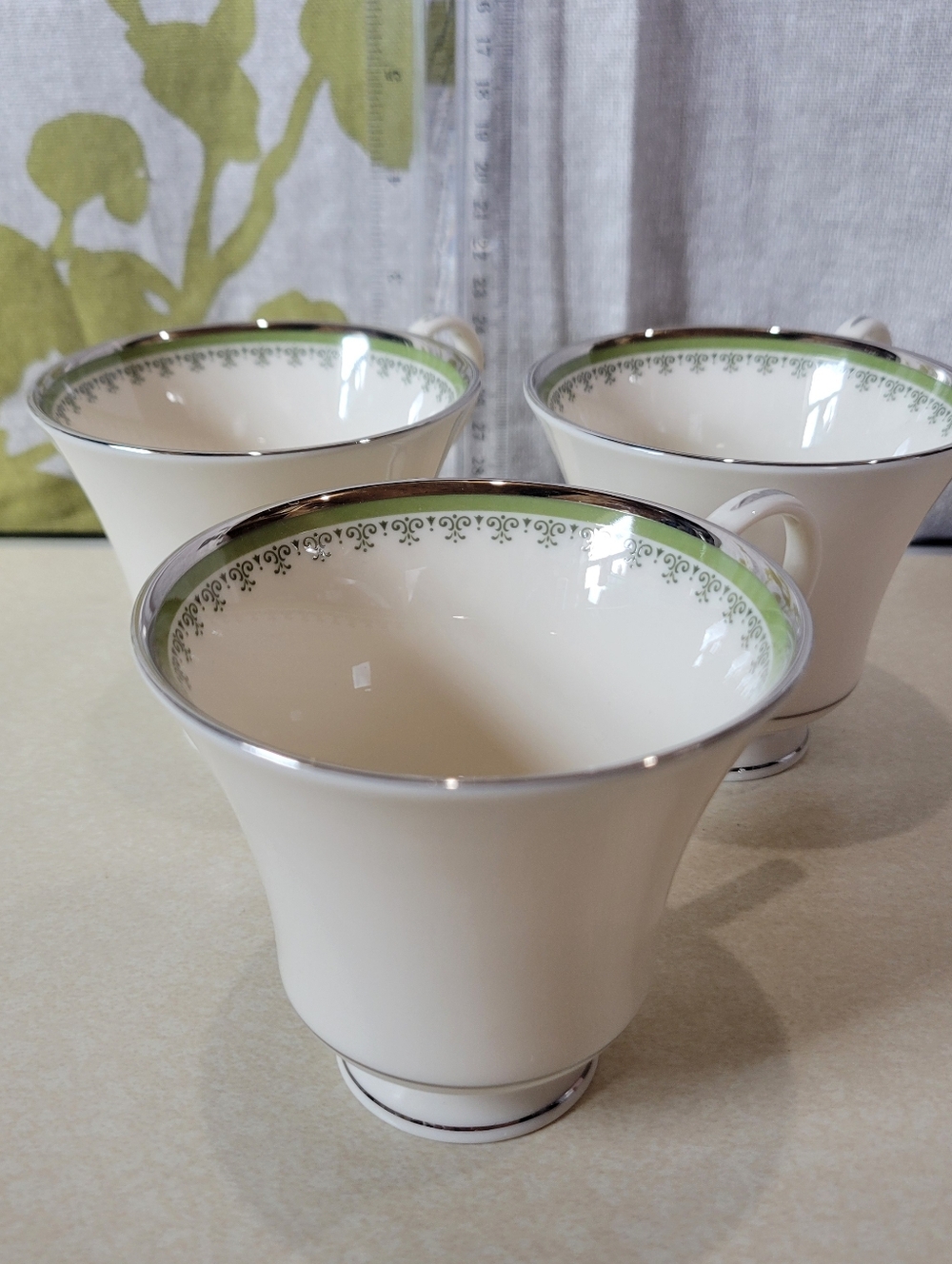 Cream Porcelain Tea Cups with Green Accent and Silver Trim - Set of 3